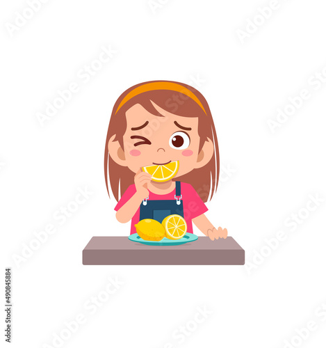 little girl eat sour lemon and show funny expression