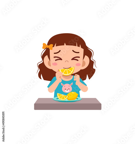 little girl eat sour lemon and show funny expression