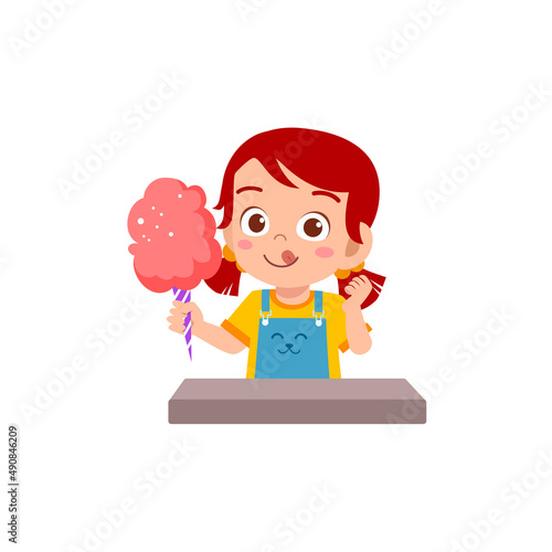 little girl eat sweet cotton candy and feel happy