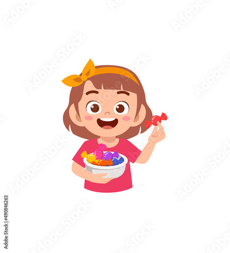 little girl eat sweet candy and feel happy