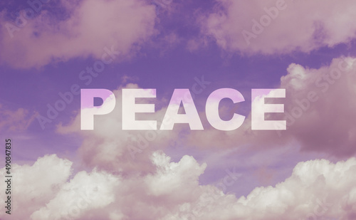 Purple sky with white clouds and a white wording PEACE
