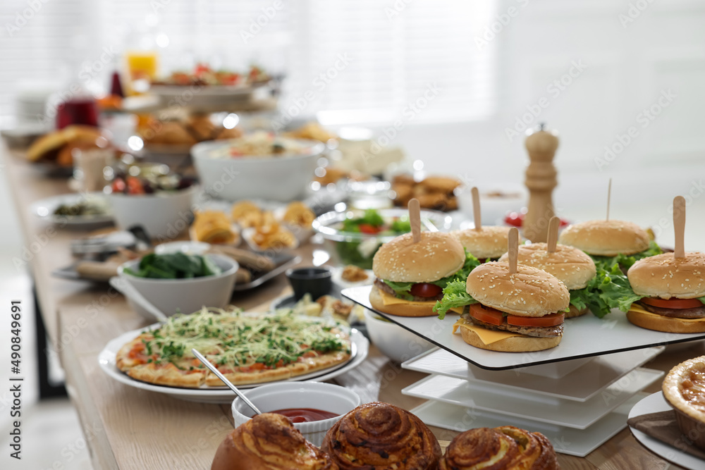 Brunch table setting with different delicious food indoors Brunch table setting with different delicious food indoors