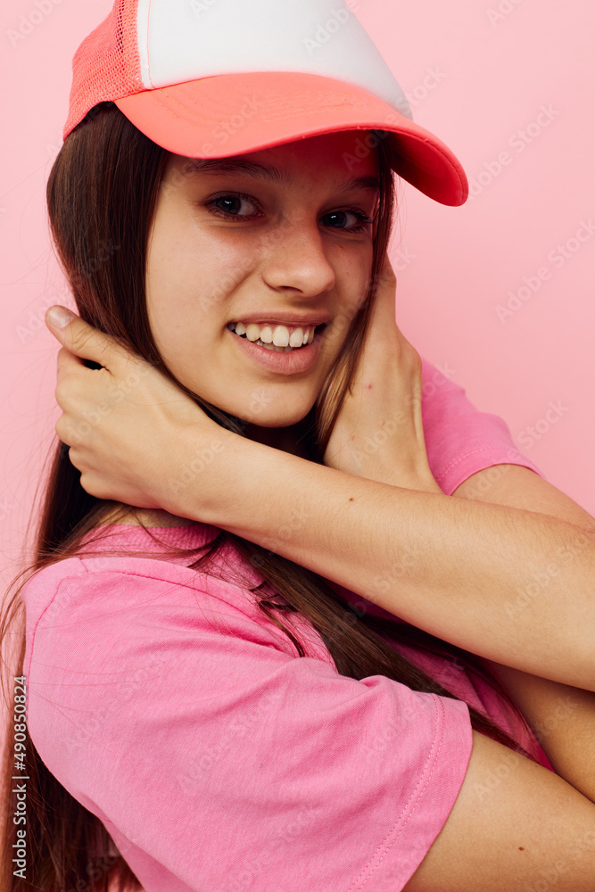 smiling woman pink t-shirts with cap on her head fashion summer style smiling woman pink t-shirts with cap on her head fashion summer style