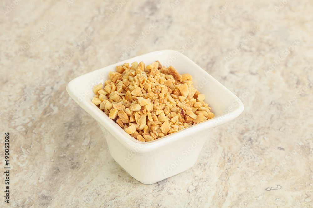 Crunched roasted peanut in the bowl Crunched roasted peanut in the bowl