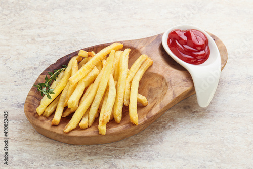 French fried potato over board