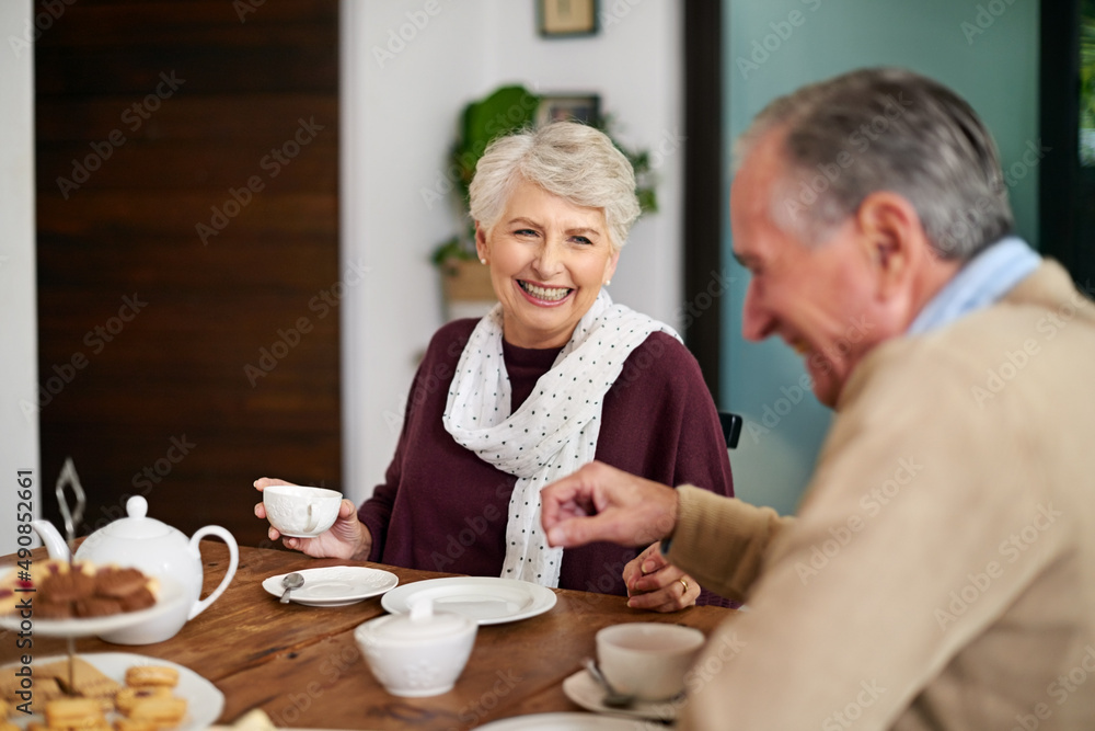 People who love to eat are the best people. Cropped shot of a senior couple having lunch at home. People who love to eat are the best people. Cropped shot of a senior couple having lunch at home.