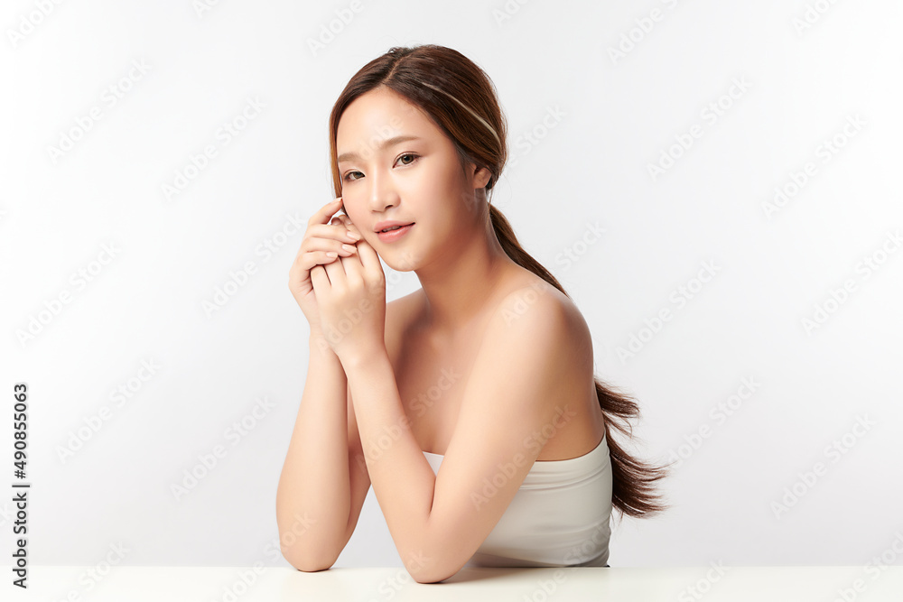 Beautiful young asian woman with clean fresh skin on white background, Face care, Facial treatment, Cosmetology, beauty and spa, Asian women portrait. Beautiful young asian woman with clean fresh skin on white background, Face care, Facial treatment, Cosmetology, beauty and spa, Asian women portrait.