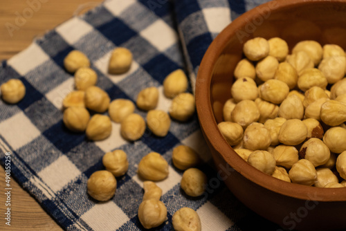 photo of the nuts in the bowl and on the cloth