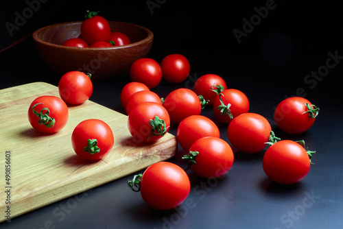 Cherry tomatoes on a dark surface