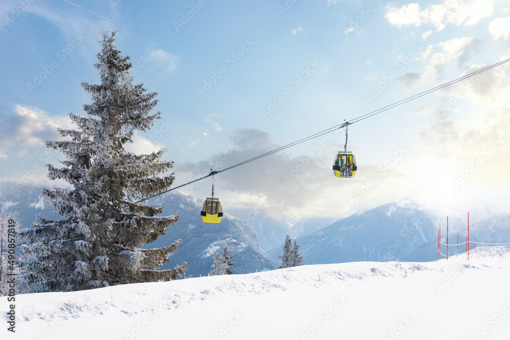Cable car in a skiing resort in Europe during winter holiday vacation.