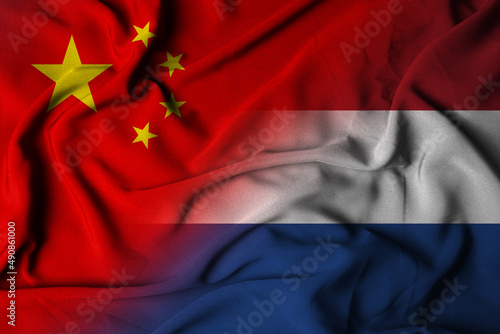 illustration, Concept of competition between People's Republic of China and Russian Federation with wavy flag on silk, selective focus