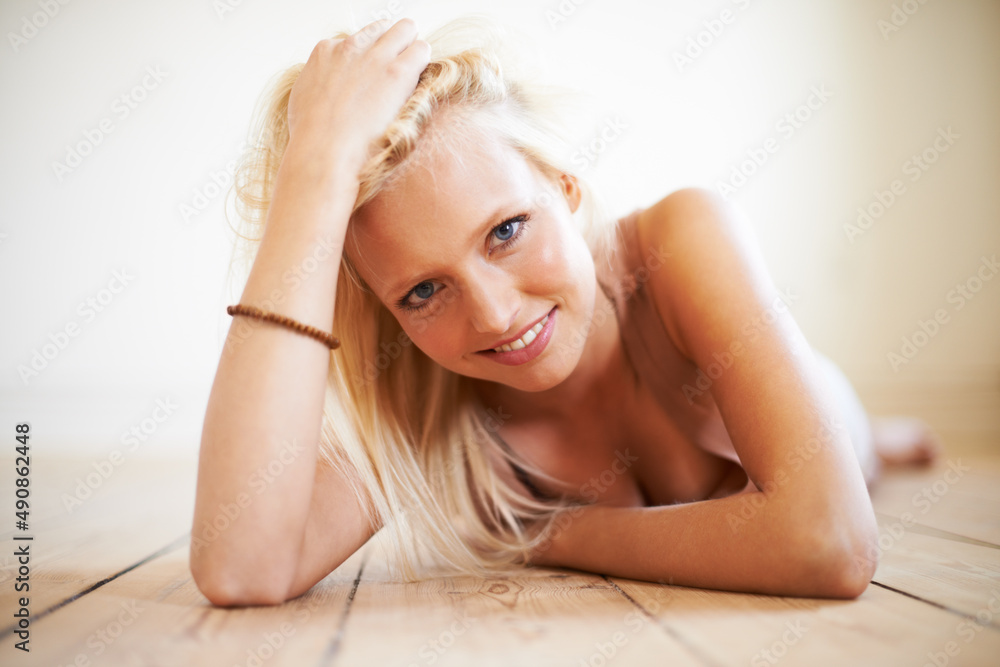 Beautiful and homely. Shot of a gorgeous young woman relaxing at home.