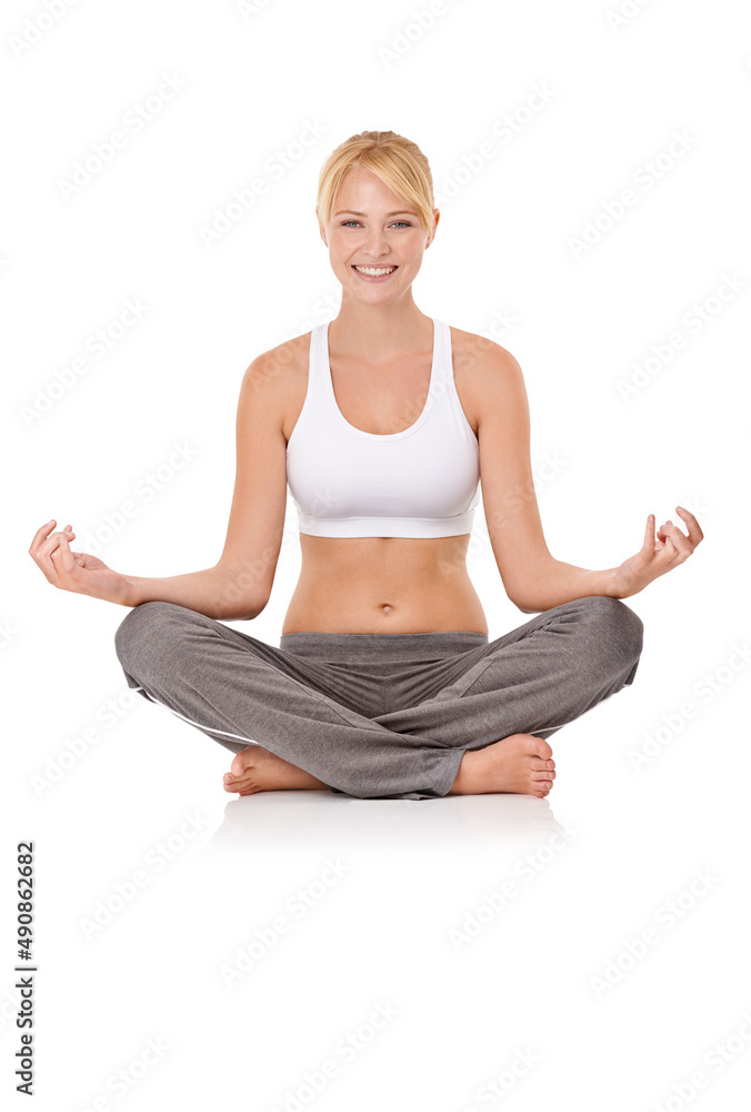 My healthy lifestyle. Portrait of an attractive young woman sitting in a meditation pose.