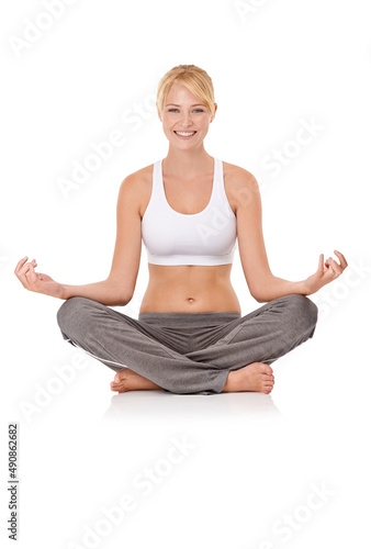My healthy lifestyle. Portrait of an attractive young woman sitting in a meditation pose.