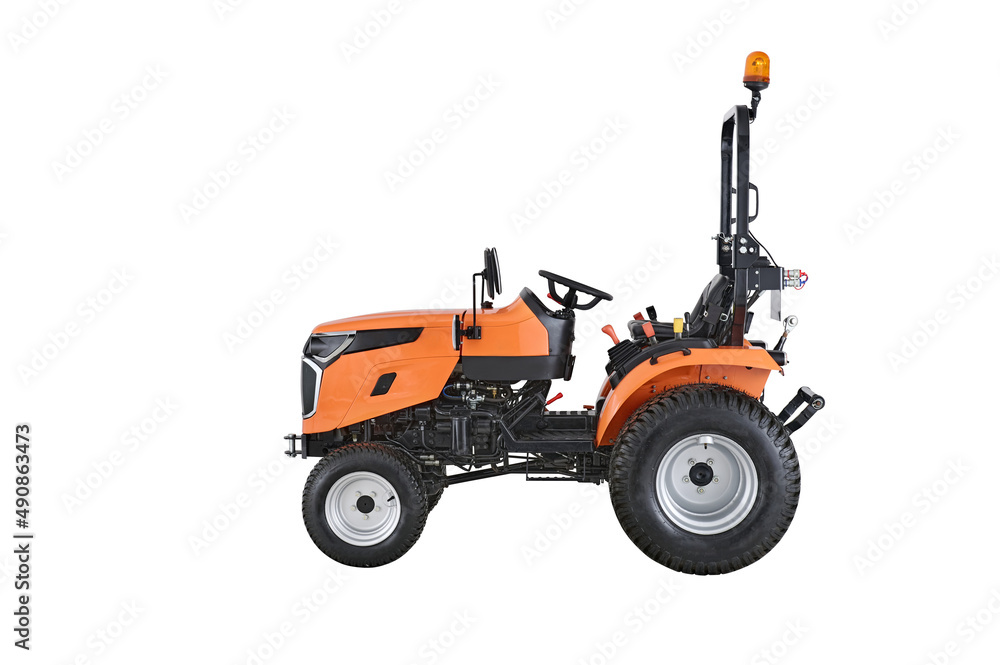 New orange agricultural tractor isolated on white background with clipping path
