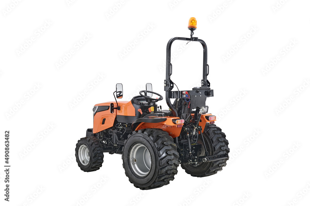 Fototapeta premium New orange agricultural tractor isolated on white background with clipping path