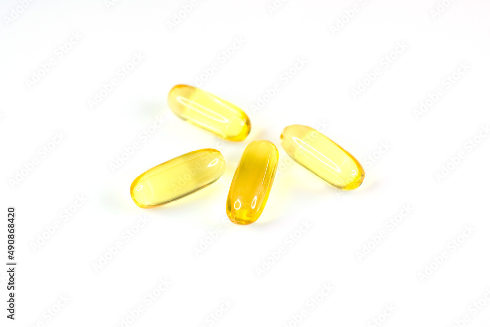 Fish oil heart tablets isolated on white Fish oil heart tablets isolated on white