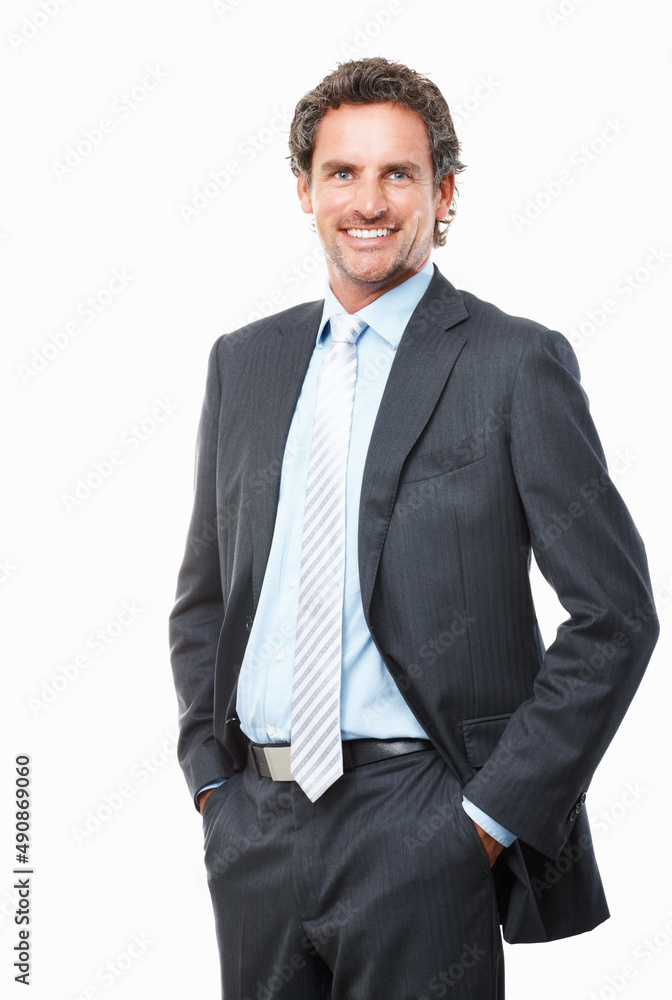Smiling business man posing on white background. Portrait of handsome business man standing with hands in pockets on white background. Smiling business man posing on white background. Portrait of handsome business man standing with hands in pockets on white background.