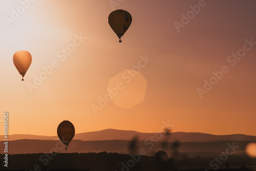 hot air balloons at sunset - freedom and adventure concept