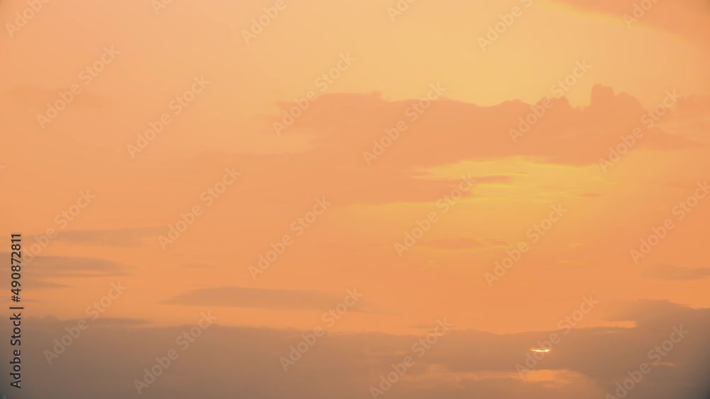 Sunset Sky. Bright Dramatic Sky With Fluffy Clouds. Yellow, Orange Colours. Dawn Sky. Sunset Sky Background. Sunset Sky. Bright Dramatic Sky With Fluffy Clouds. Yellow, Orange Colours. Dawn Sky. Sunset Sky Background.