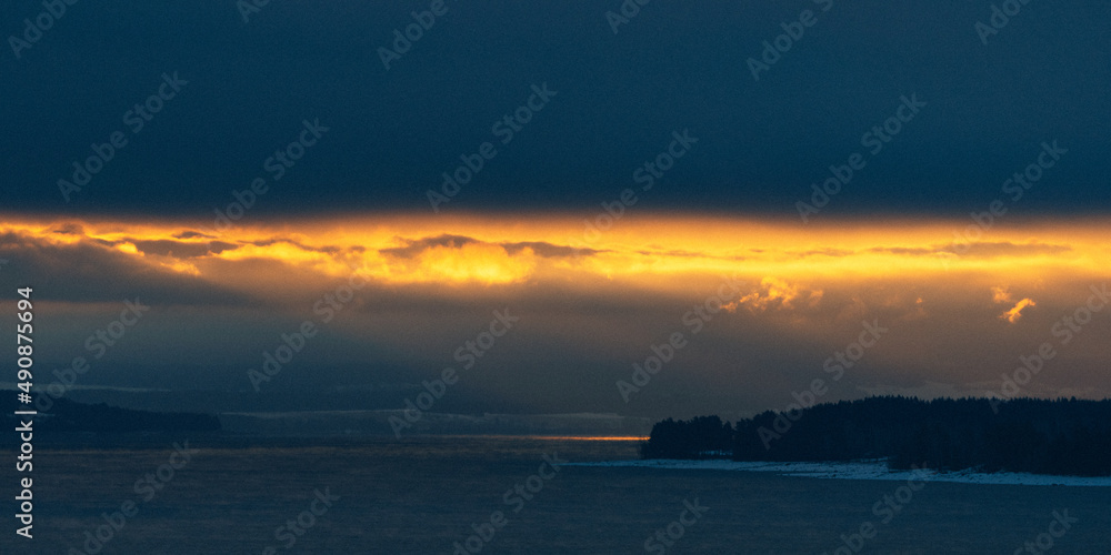 Sunrise above Lake Mjøsa in winter.