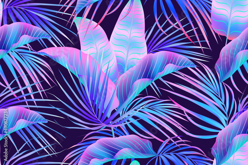 Jungle purple neon tropical leaves seamless pattern.Summer exotic botanical foliage.Fluorescent vectors colors.