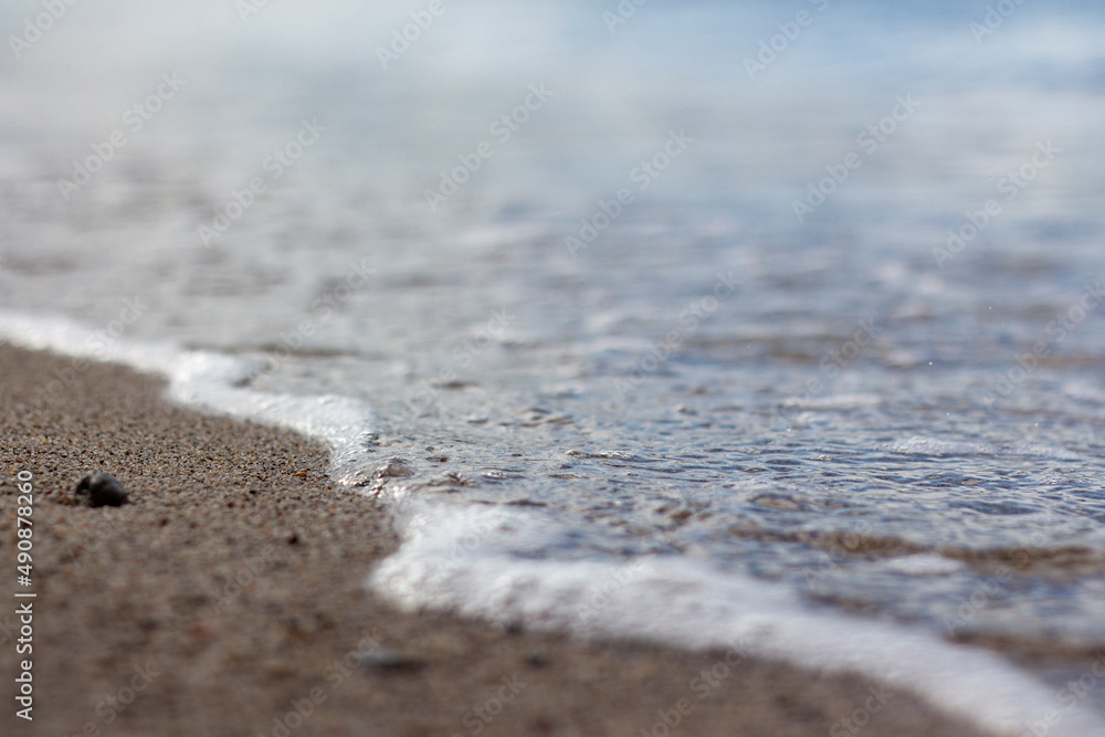 wave splash sea beach macro, close up, Close up of sea foam and wet sand. wave splash sea beach macro, close up, Close up of sea foam and wet sand.