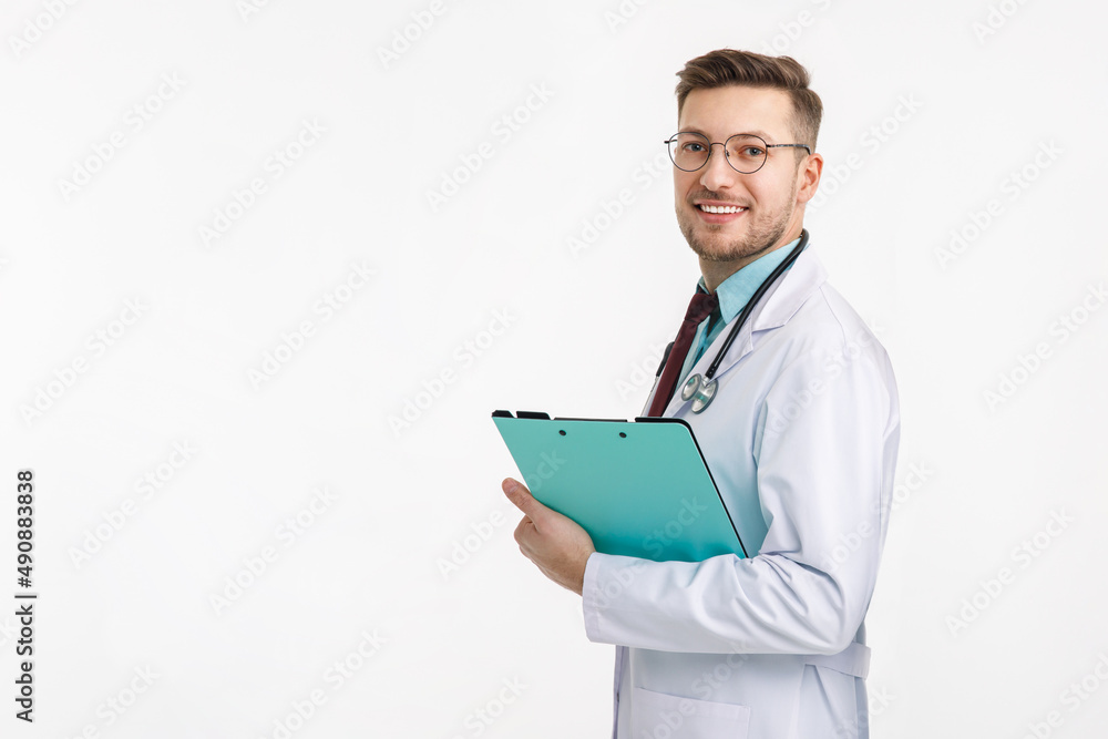 Portrait of confident young medical doctor on white background. Portrait of confident young medical doctor on white background.