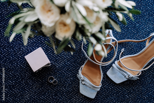 Wedding Jewelry Rings, Bride Shoes and Flowers photo