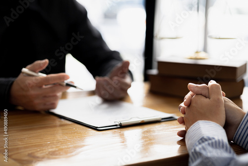 Photography Client was listening to a lawyer advising on an embezzlement case, explaining the details of the proceeding and gathering evidence to file a lawsuit against the defendant