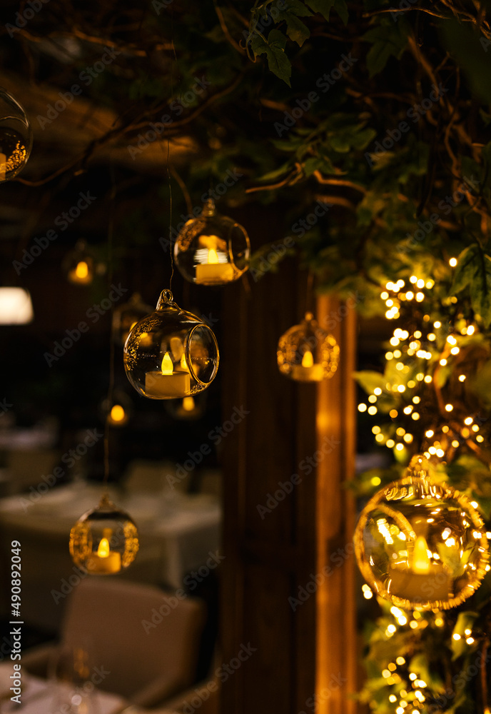 Decoration lights in the restaurant. Decoration for a room. Golden tree Decoration lights in the restaurant. Decoration for a room. Golden tree