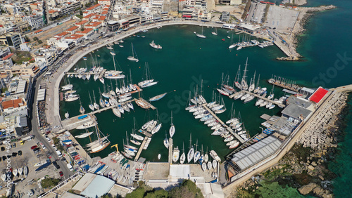 Aerial drone photo of iconic round shaped picturesque port of Mikrolimano with anchored sail boats and yachts after renovation, Piraeus, Attica, Greece photo