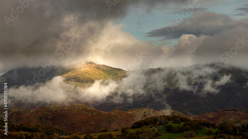 Moody and dramatic shot of Great Rigg - a fell in the English Lake District, north-west of Ambleside and reaching a height of 766 metres. It is most often climbed as part of the Fairfield horseshoe.  photo