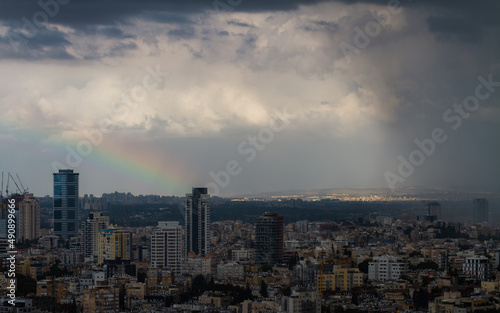Rainbow and rain in Ramat Gan, Israel. Top city view