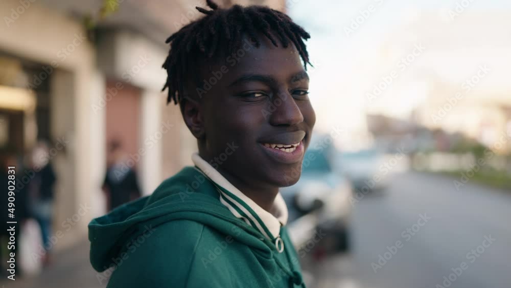 African american man smiling confident standing at street African american man smiling confident standing at street