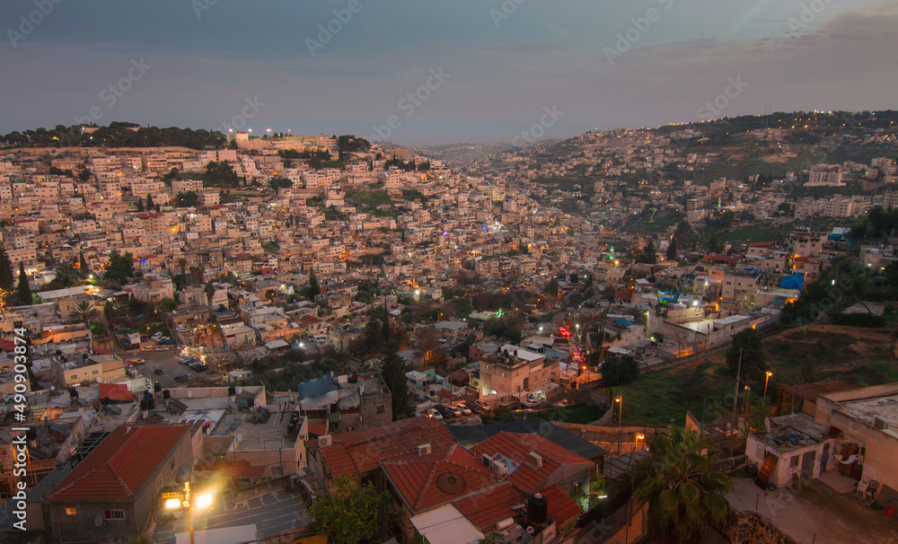 Arab neighborhoods in Jerusalem. Gehenna valley at evening