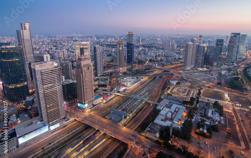 Tel Aviv and Ramat Gan modern aerial panorama. Top evening view above with skyscrapers and highways
