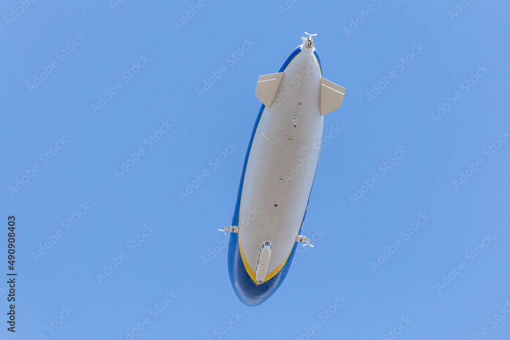 Fototapeta premium Zeppelin flying over the sky - In summer sky - Denmark