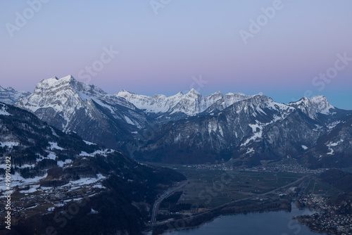 What a wonderful sunrise in the Swiss Alps, in the canton of Glarus to be exact. The sky turns red and pink over the mountain peaks. © Philip