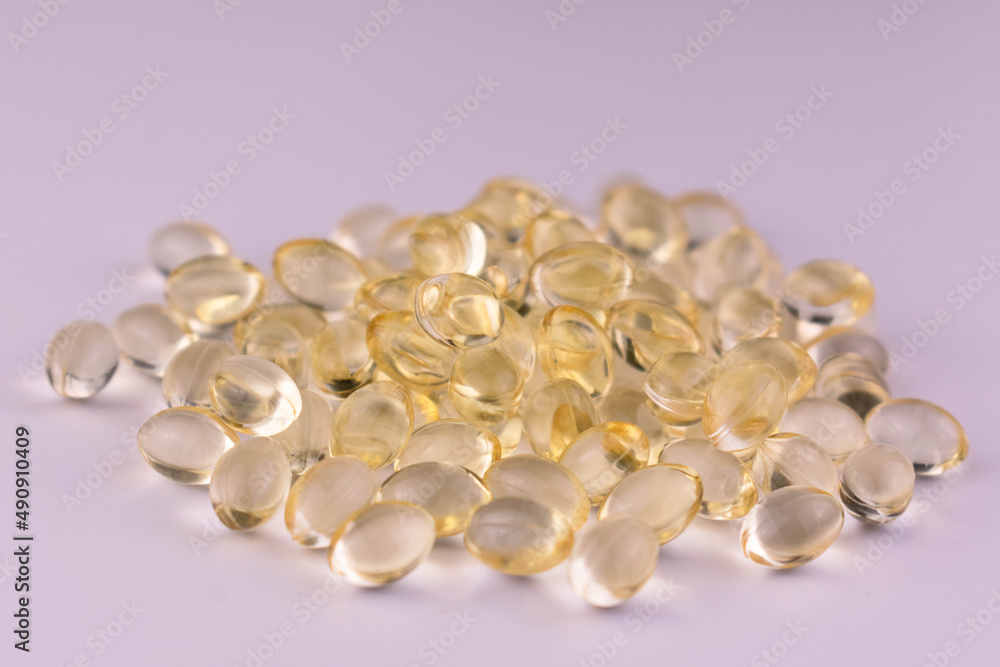 Many vitamin D capsules. Close-up. Many vitamin D capsules. Close-up.