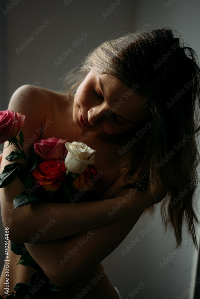 Beautiful woman in white dress with flowers Beautiful woman in white dress with flowers