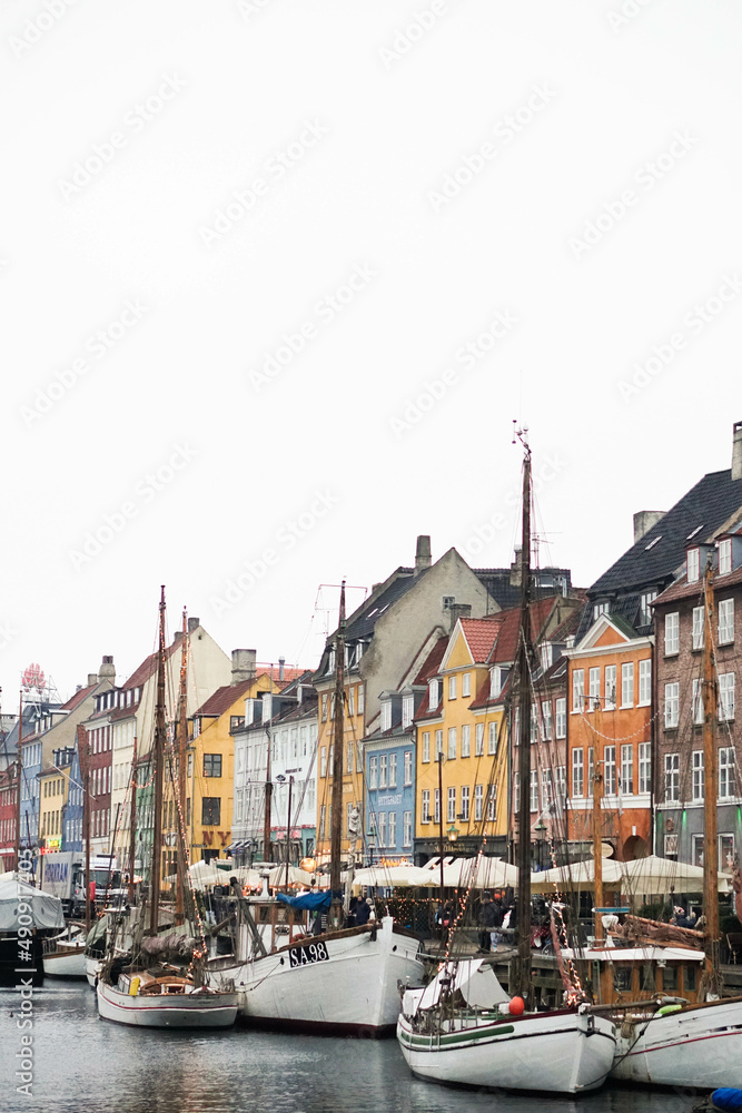 Streets of Copenhagen, Denmark. Houses and streets of Copenhagen. City landscape. Traditional architecture in Copenhagen, Denmark, colorful houses on the famous Nyhavn street