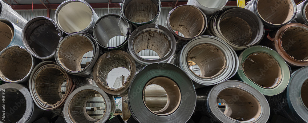 stack of Coil steel metal rolls in metal roofing factory stack of Coil steel metal rolls in metal roofing factory
