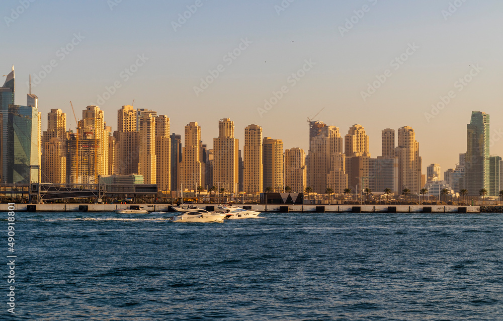 Fototapeta premium Dubai, UAE - 02.20.2022 View of a towers in Jumeirah beach residence district. City