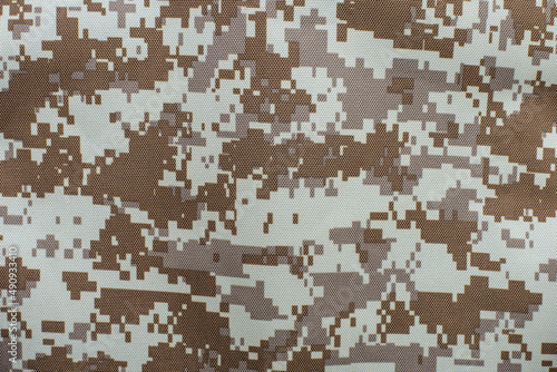 Fabric with a background of a soldier's military uniform, protective fabric for military shelter, close up