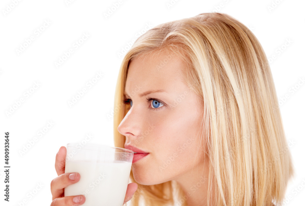 Get refreshed. Shot of a young woman enjoying a drink. Get refreshed. Shot of a young woman enjoying a drink.