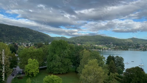 Aerial panorama view of Lake Wörth (Wörthersee) from Pörtschach on a summerday with blue sky cloud and the Alps, Carinthia, Austria