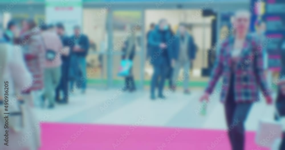 time lapse. modern business life. defocused blurry video. background on the theme of business. blurred silhouettes of unrecognizable people walking in a large hall. time lapse. modern business life. defocused blurry video. background on the theme of business. blurred silhouettes of unrecognizable people walking in a large hall.