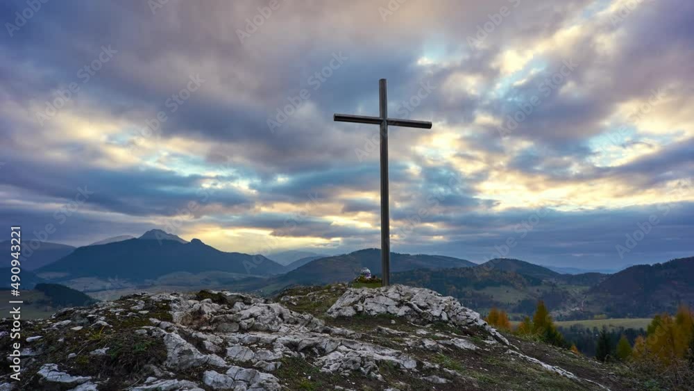 Christian Cross On A Rock At Sunset , Colourfull clouds. Christian Cross On A Rock At Sunset , Colourfull clouds.