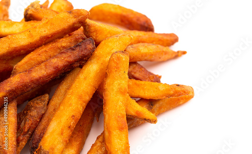 Pile of Crispy French Fries Isolated on a White Background